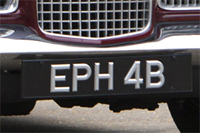 Identify the letters and numbers in this image