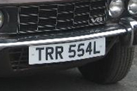 Identify the letters and numbers in this image
