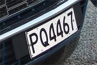 Identify the letters and numbers in this image