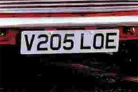 Identify the letters and numbers in this image