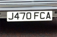 Identify the letters and numbers in this image