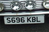 Identify the letters and numbers in this image