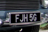 Identify the letters and numbers in this image