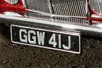 Identify the letters and numbers in this image