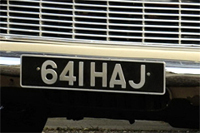 Identify the letters and numbers in this image