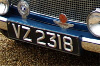 Identify the letters and numbers in this image