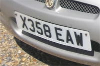 Identify the letters and numbers in this image