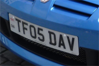 Identify the letters and numbers in this image