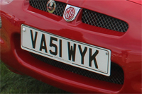 Identify the letters and numbers in this image