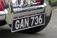 Identify the letters and numbers in this image