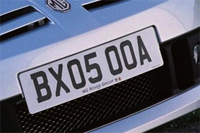 Identify the letters and numbers in this image