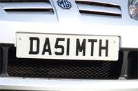 Identify the letters and numbers in this image
