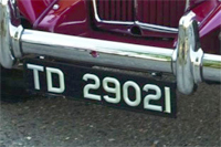 Identify the letters and numbers in this image