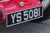 Identify the letters and numbers in this image