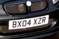 Identify the letters and numbers in this image