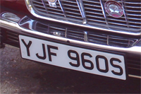 Identify the letters and numbers in this image