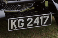 Identify the letters and numbers in this image