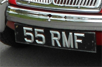 Identify the letters and numbers in this image