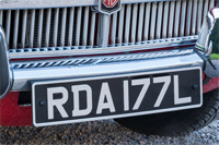 Identify the letters and numbers in this image
