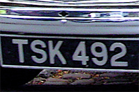 Identify the letters and numbers in this image