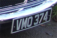 Identify the letters and numbers in this image
