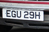 Identify the letters and numbers in this image
