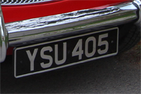 Identify the letters and numbers in this image