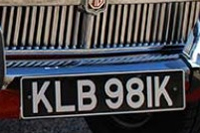 Identify the letters and numbers in this image