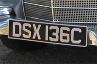 Identify the letters and numbers in this image