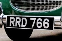 Identify the letters and numbers in this image