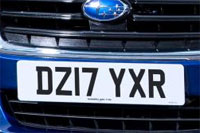 Identify the letters and numbers in this image