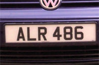Identify the letters and numbers in this image