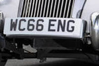 Identify the letters and numbers in this image