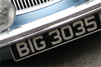 Identify the letters and numbers in this image