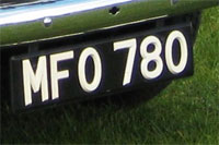 Identify the letters and numbers in this image