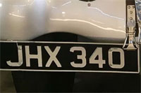 Identify the letters and numbers in this image