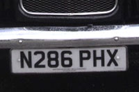 Identify the letters and numbers in this image