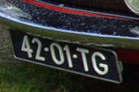 Identify the letters and numbers in this image