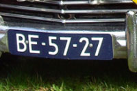 Identify the letters and numbers in this image