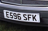 Identify the letters and numbers in this image
