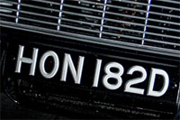 Identify the letters and numbers in this image