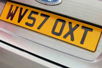 Identify the letters and numbers in this image