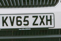 Identify the letters and numbers in this image