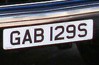 Identify the letters and numbers in this image