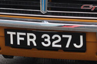 Identify the letters and numbers in this image