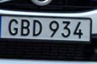 Identify the letters and numbers in this image