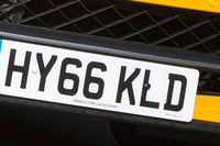 Identify the letters and numbers in this image