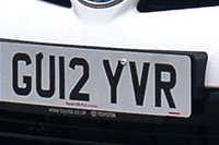 Identify the letters and numbers in this image