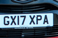 Identify the letters and numbers in this image