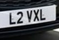 Identify the letters and numbers in this image